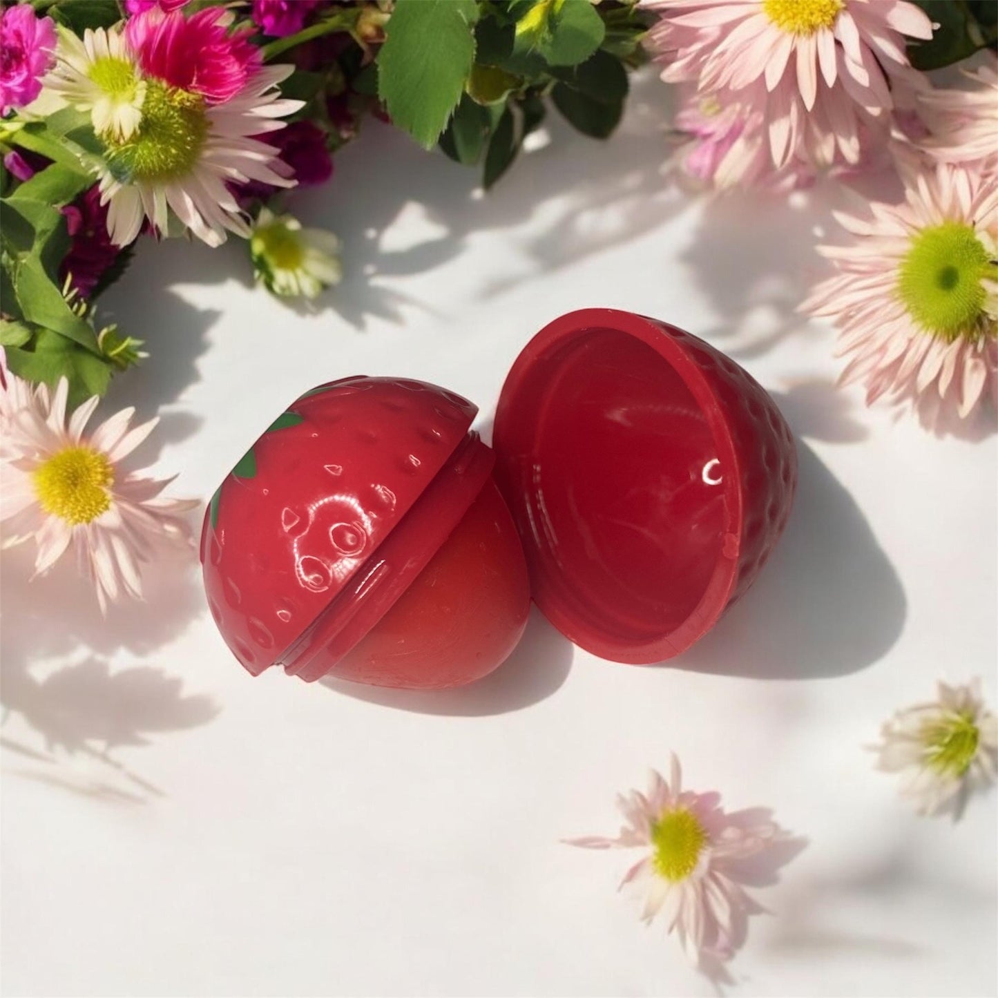 Strawberry shaped novelty lip balm