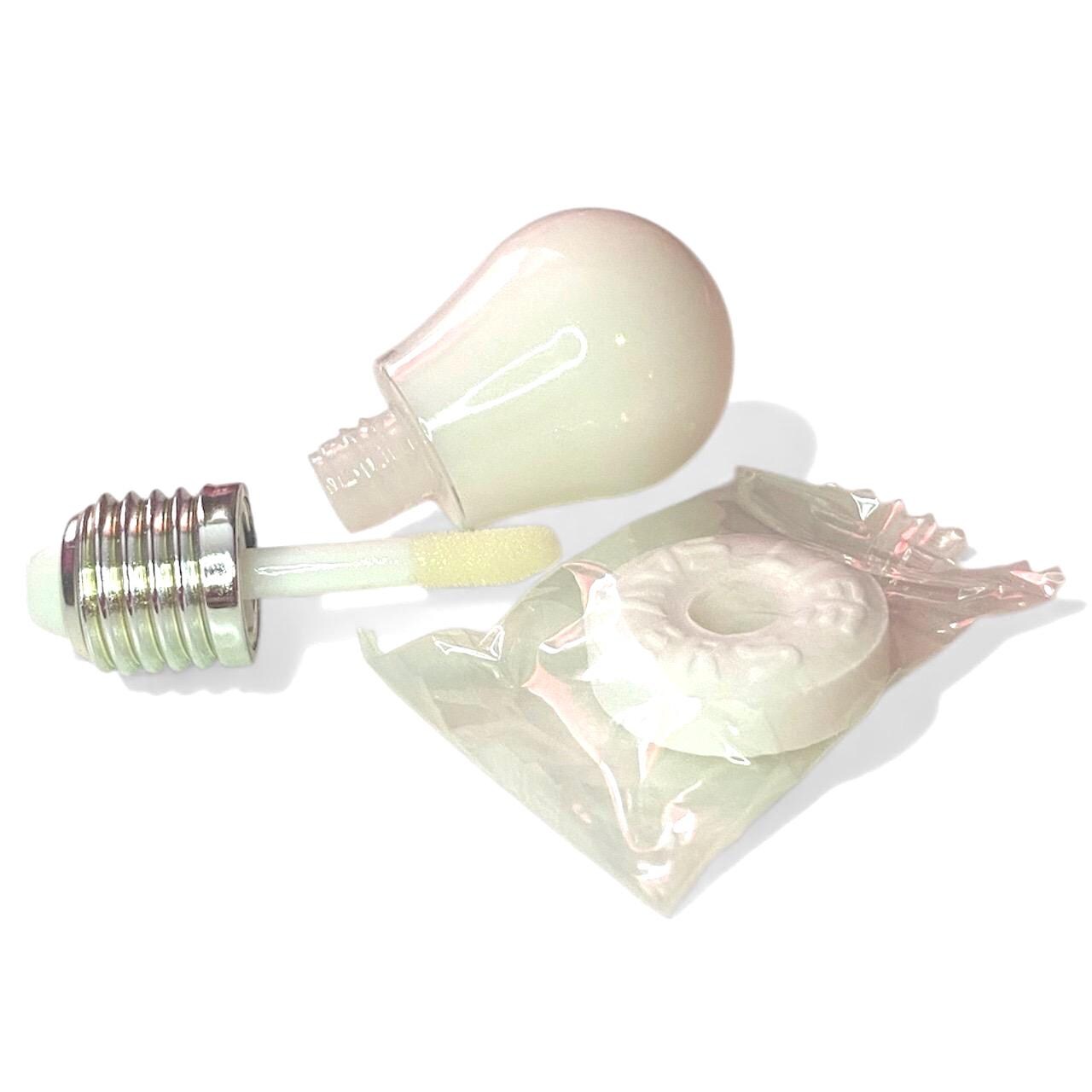 marshmallow or wintermint flavored light bulb shaped novelty lip gloss